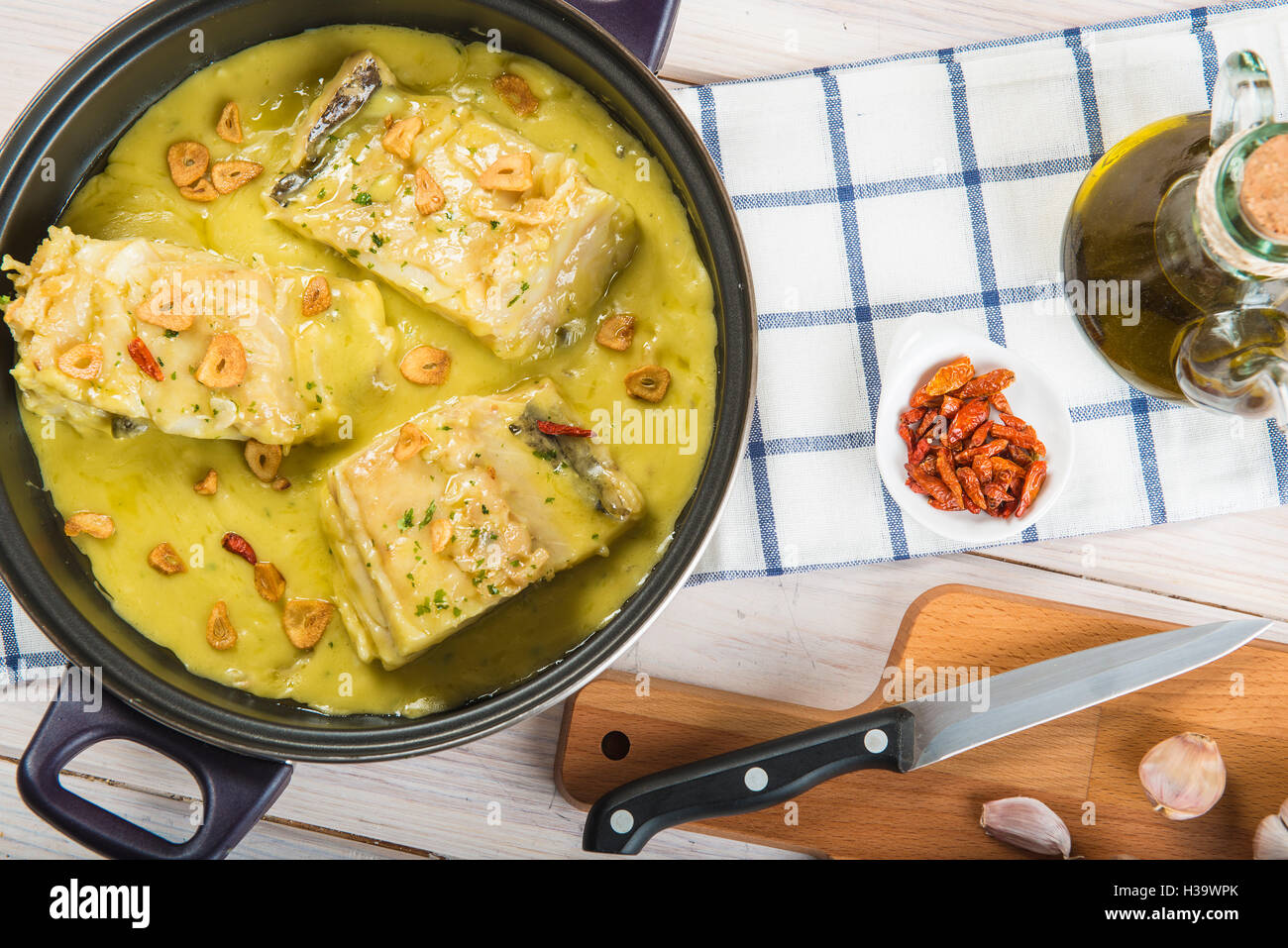 Salt cod in a pilpil sauce a typical Spanish recipe Stock Photo Alamy