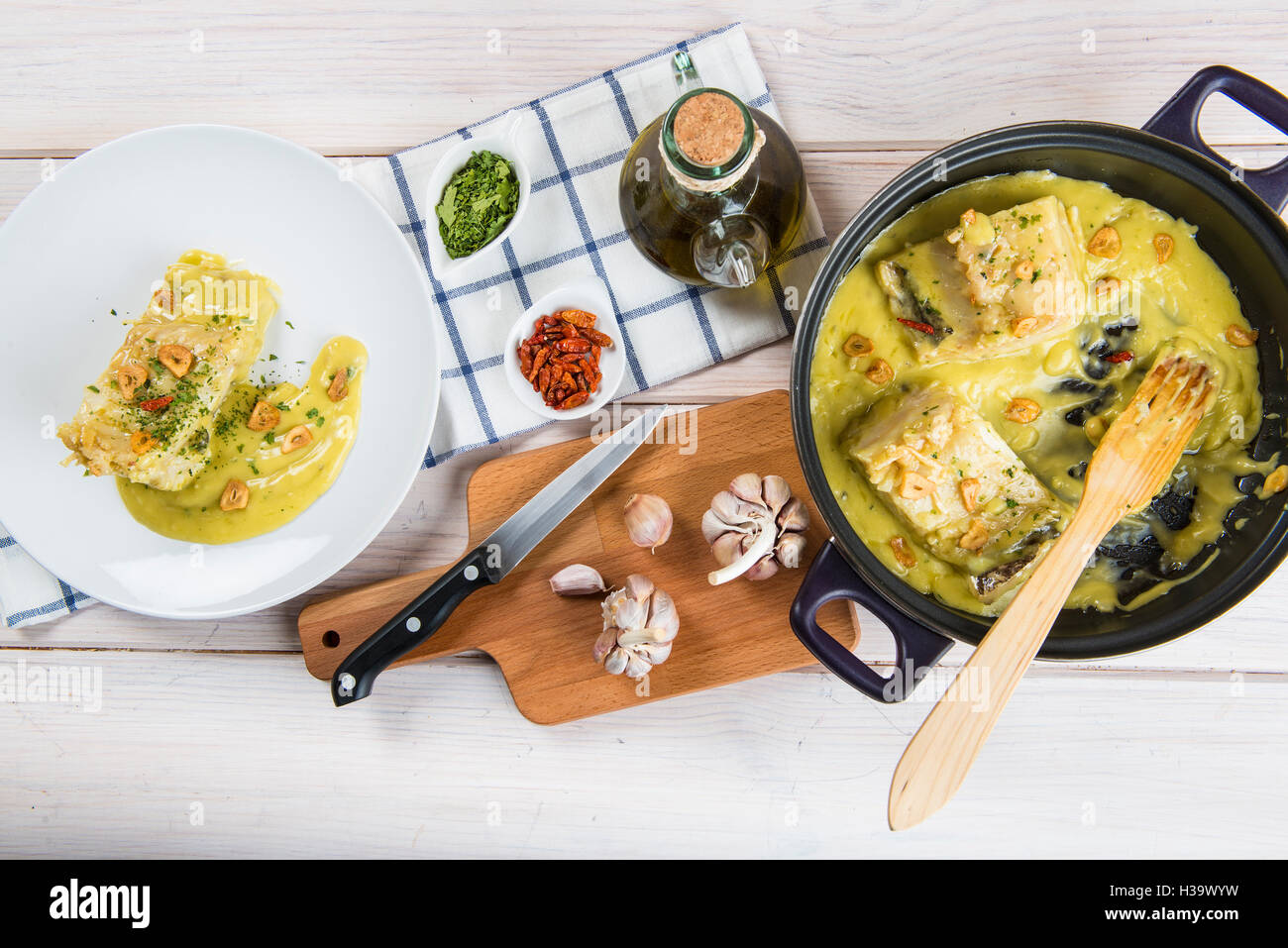 Salt cod in a pilpil sauce a typical Spanish recipe Stock Photo Alamy
