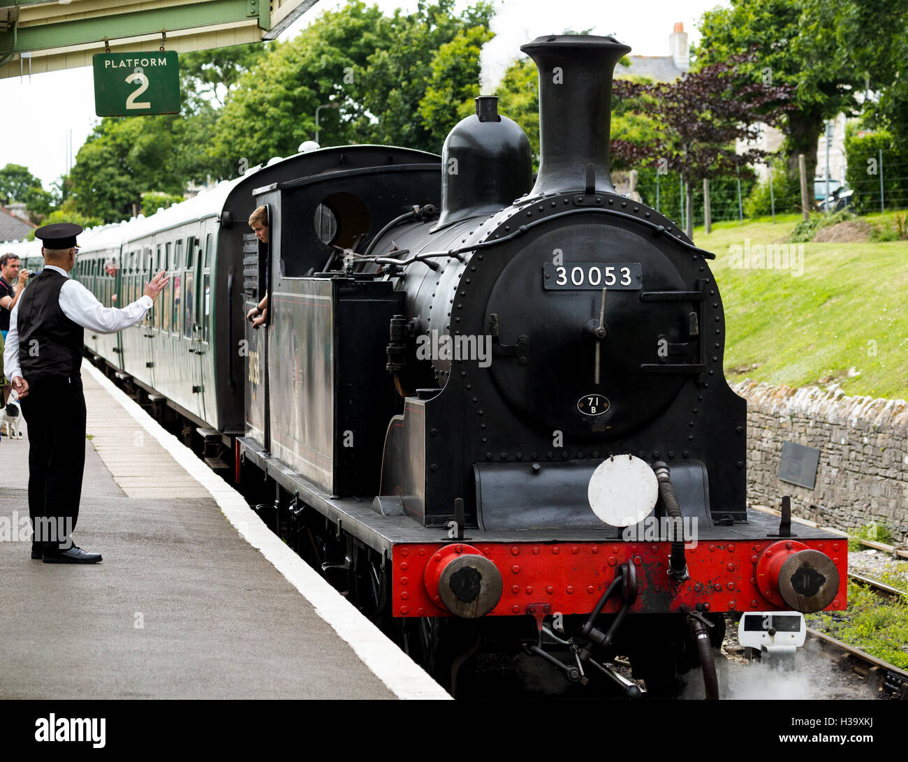 LSWR M7 class steam locomotive No. 30053 , arriving Swanage station England UK Stock Photo