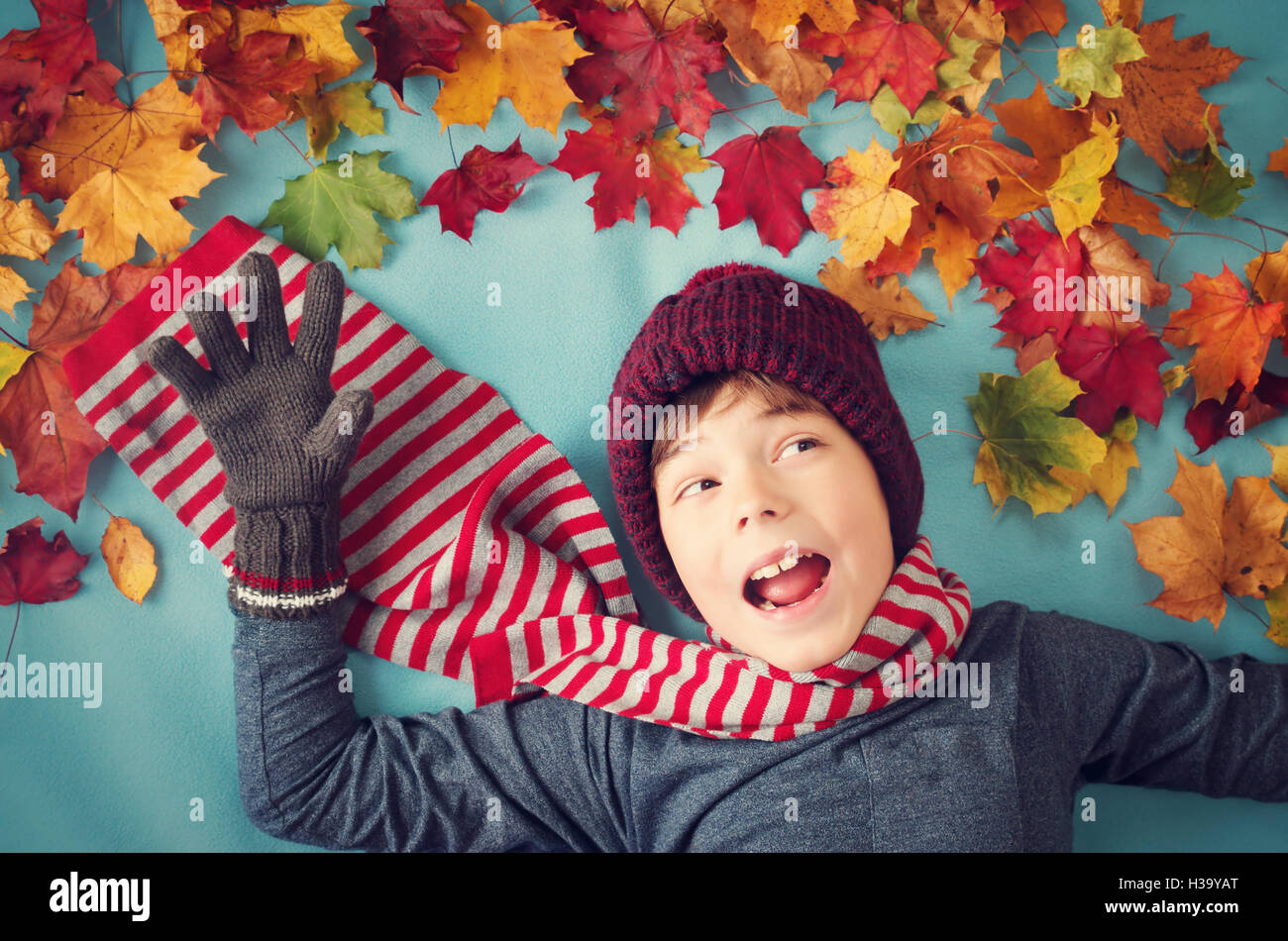 seven years old boy dreaming in autumn Stock Photo Alamy