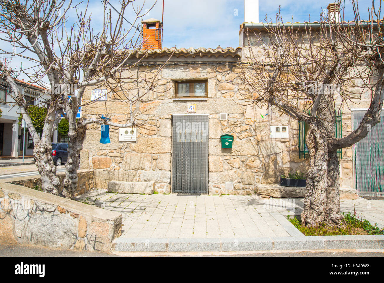 Facade of traditional stone house. Colmenar del Arroyo, Madrid province, Spain. Stock Photo