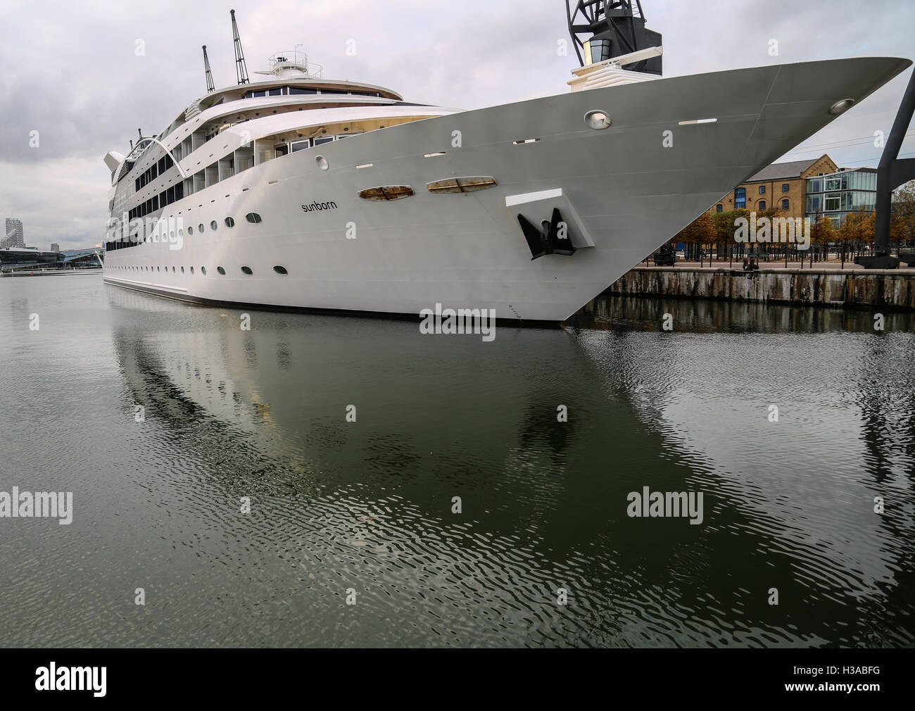 View of a ship's reflection in the port outside ExCeL London, Royal Victoria Dock, in Canning Town, London. Stock Photo