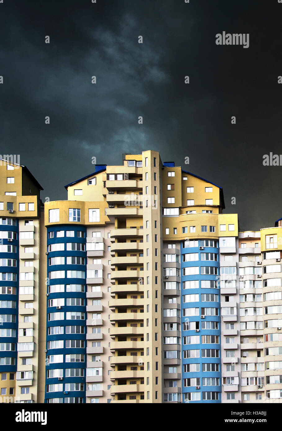 Apartment building under the heavy black rainy clouds Stock Photo Alamy