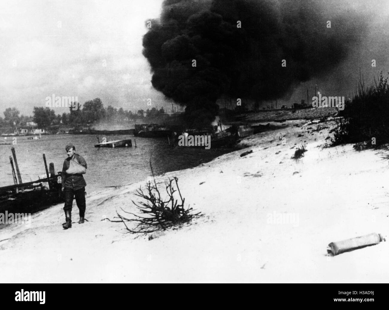 Burning port facilities on the Dnieper, 1941 Stock Photo