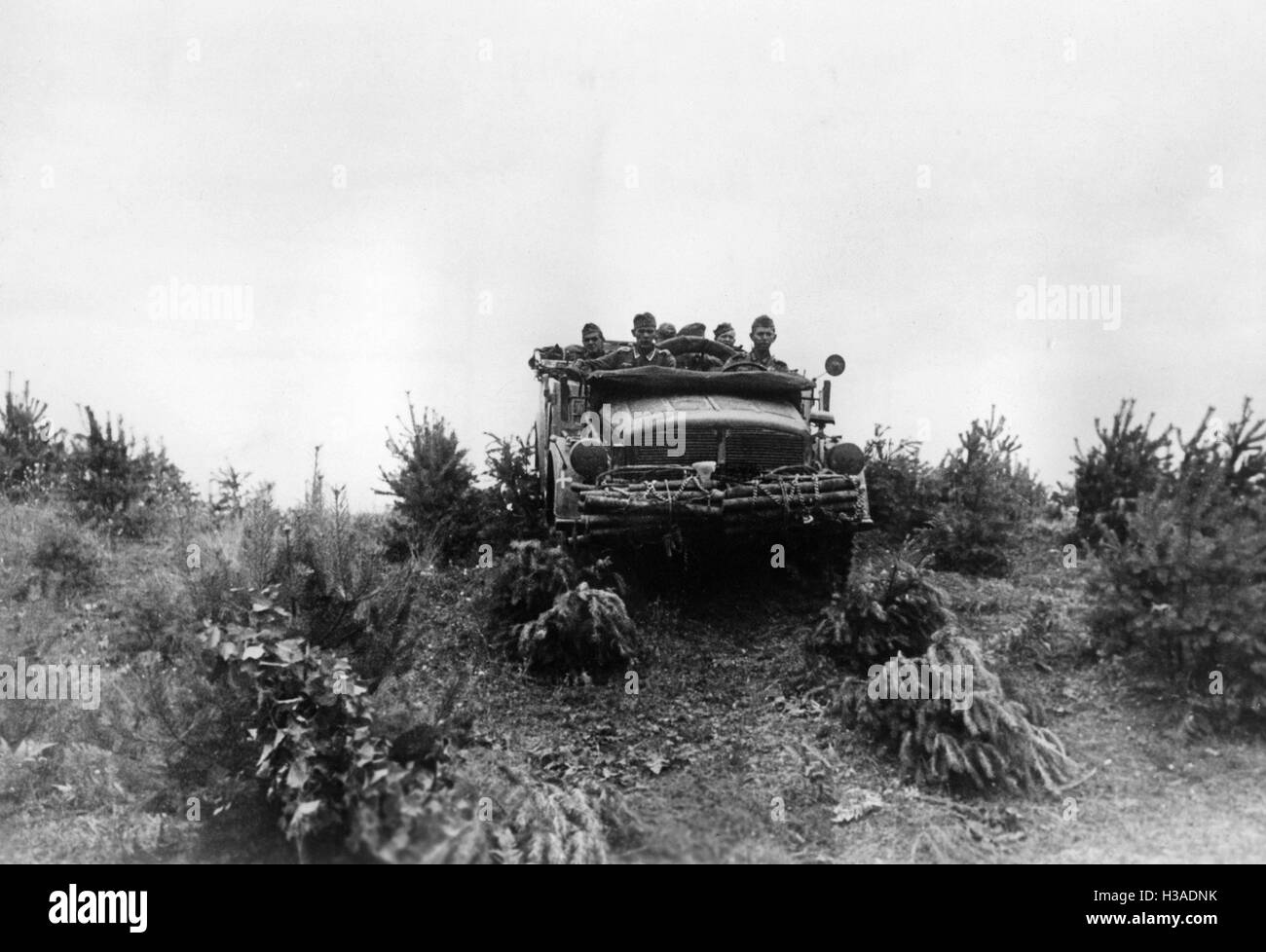 A vehicle of the Wehrmacht passes through roadless terrain on the Eastern front, 1941 Stock Photo