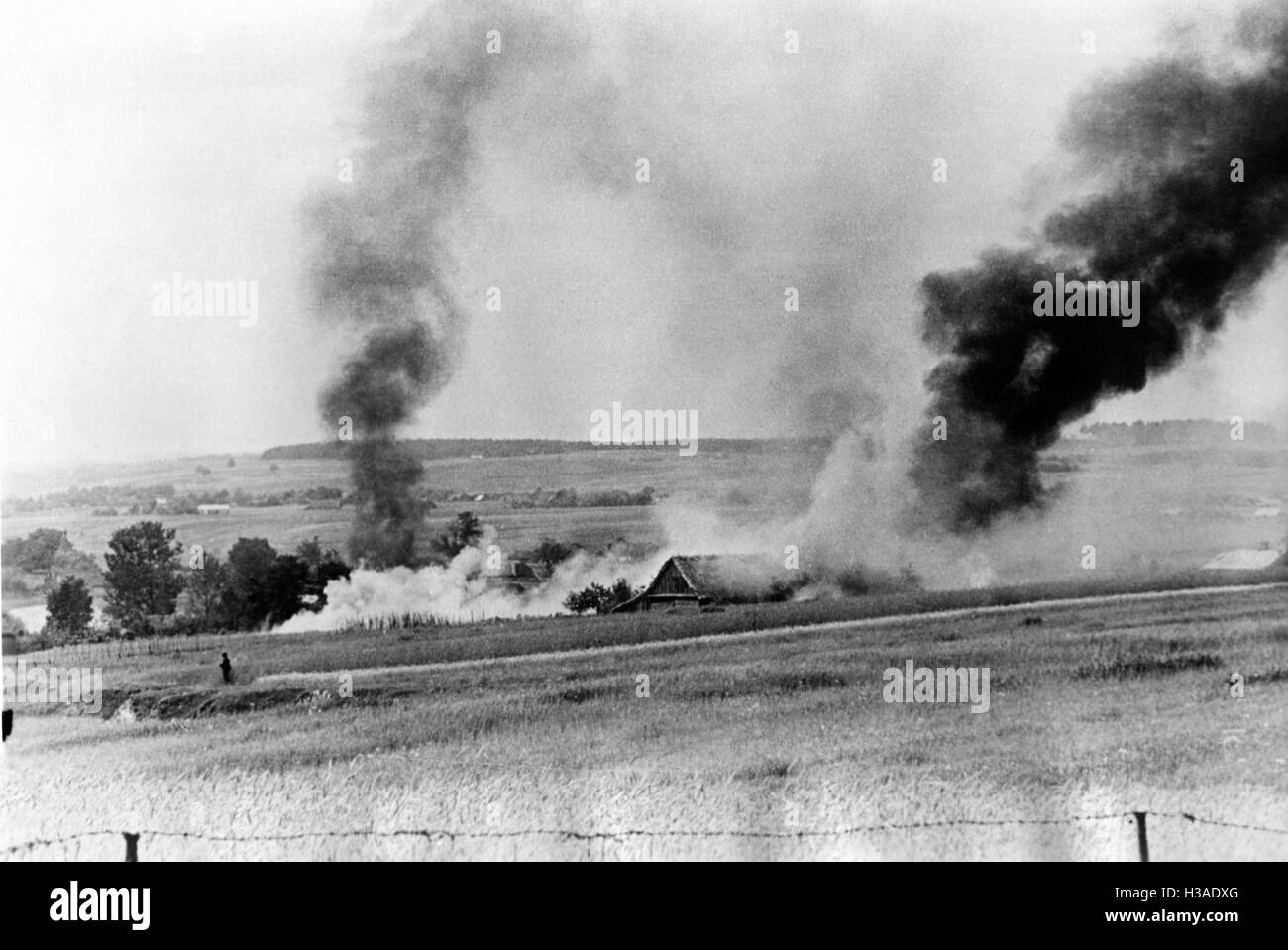 Burning farm on the Eastern Front, 1941 Stock Photo