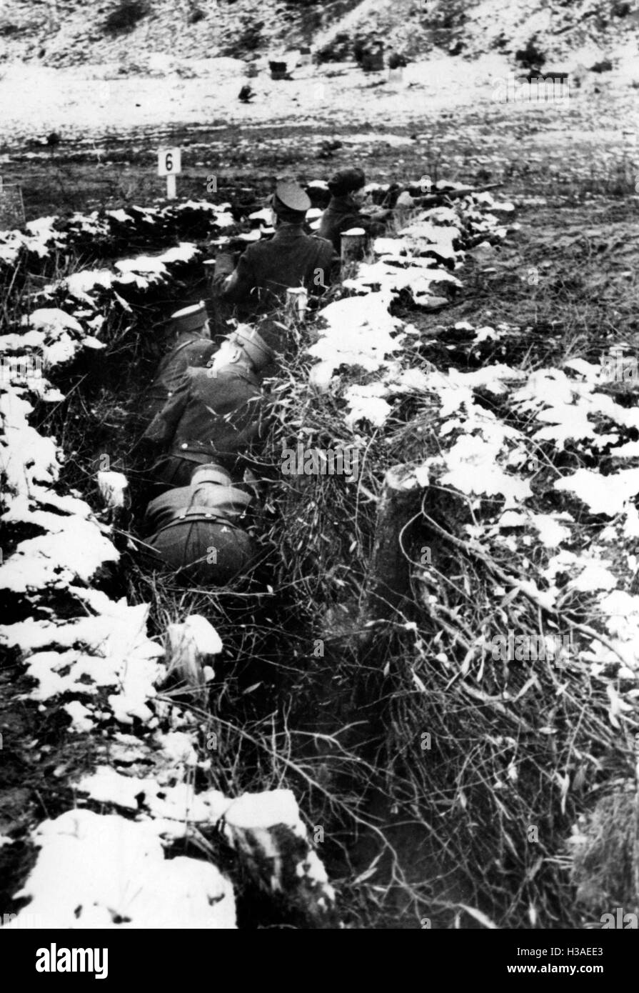 Volkssturm member during shooting practice in a field, 1944 Stock Photo