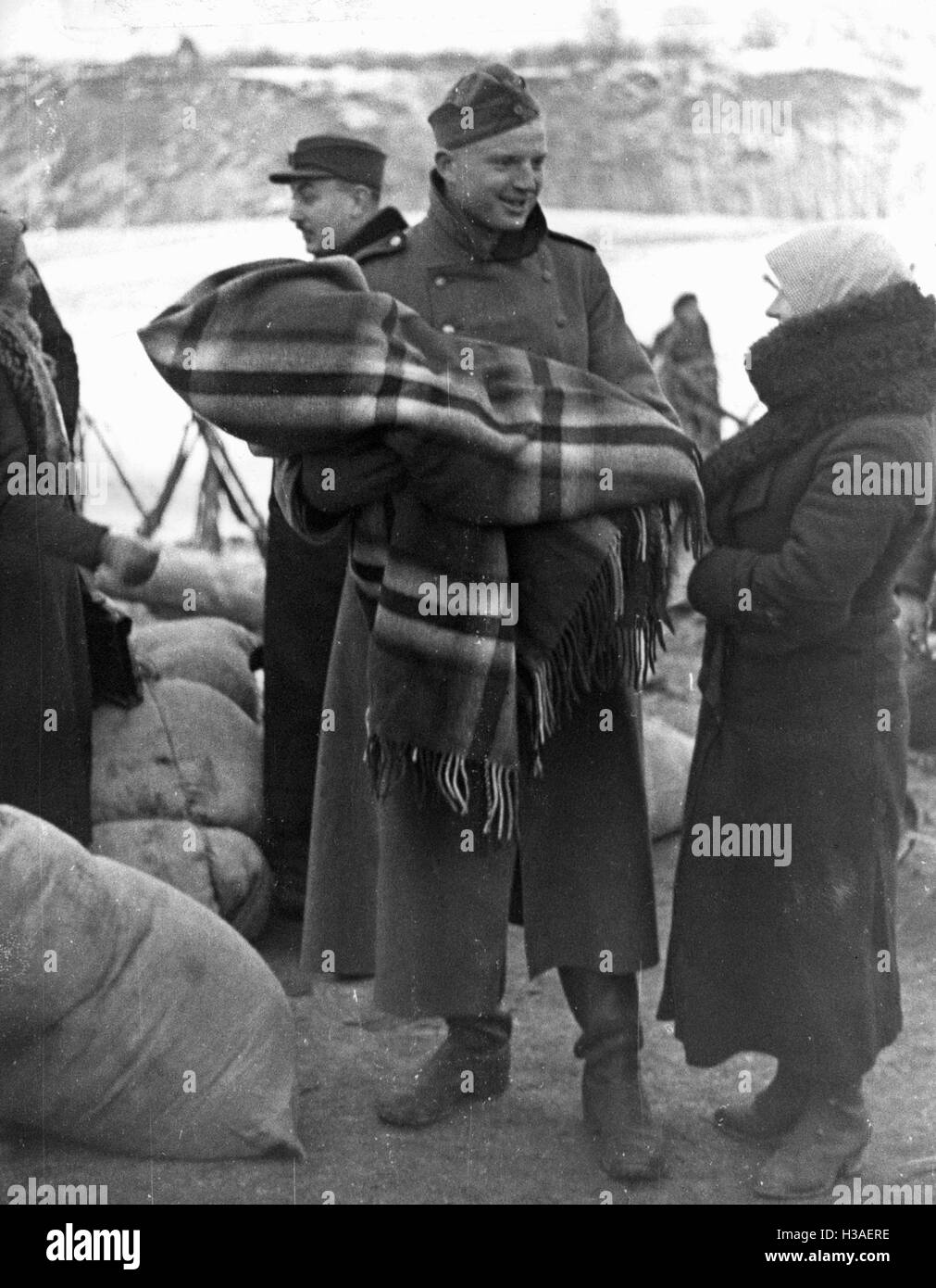 Soldier with Volhynian Germans, 1939 Stock Photo