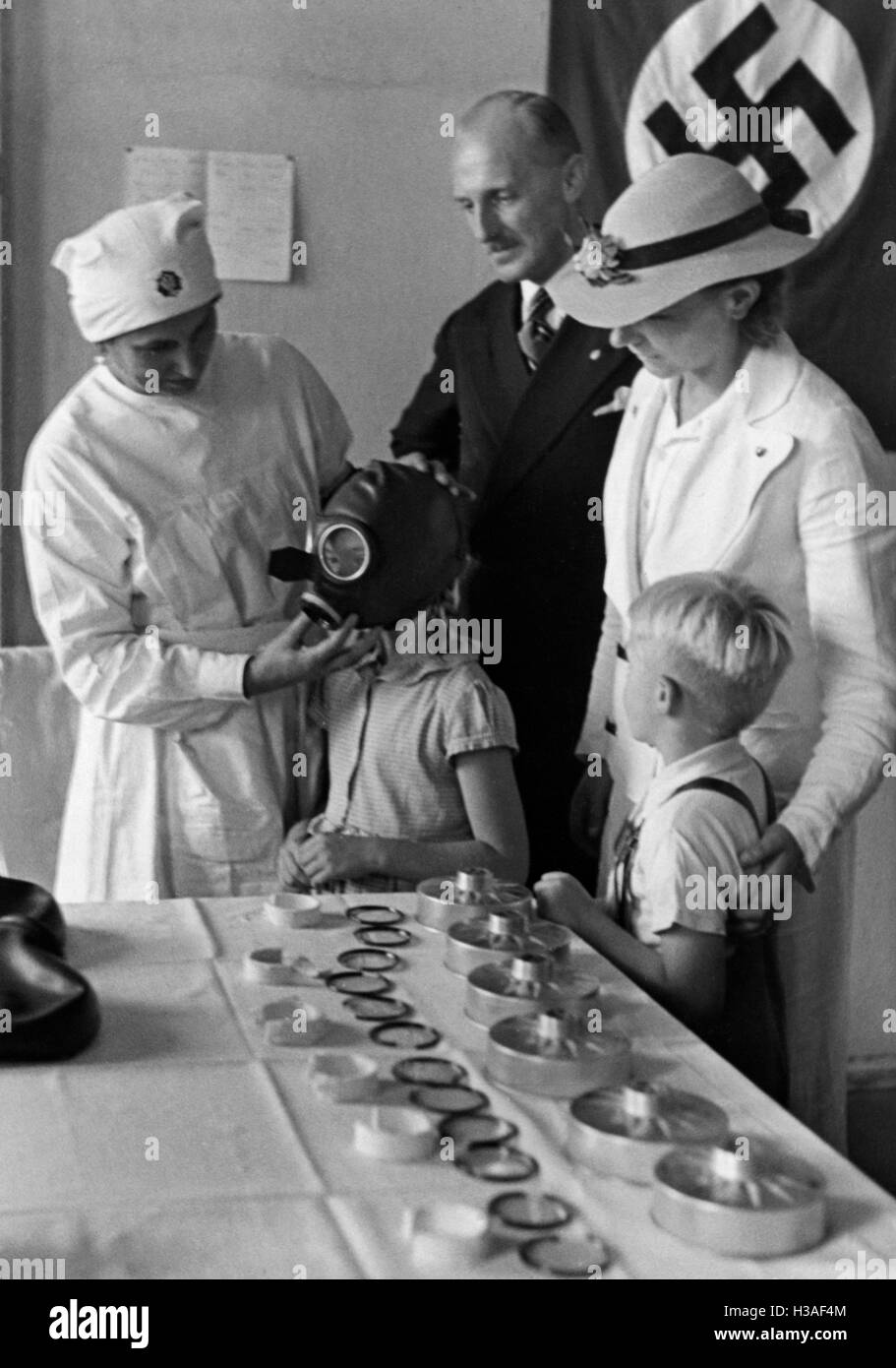 Distribution center for gas masks, 1937 Stock Photo