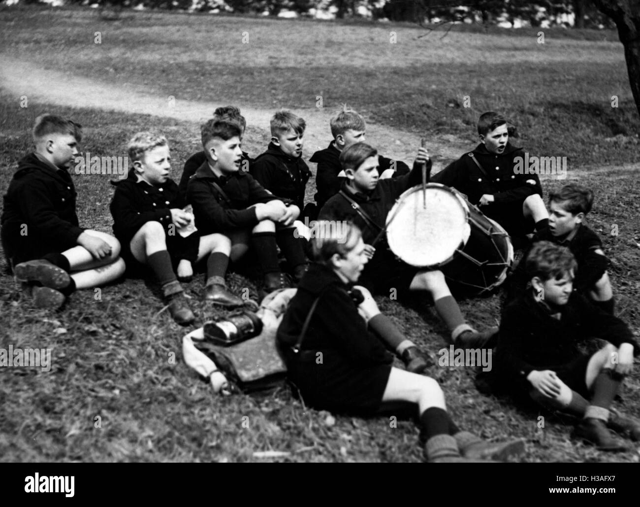 Jungvolk boys rest during a hike, 1934 Stock Photo
