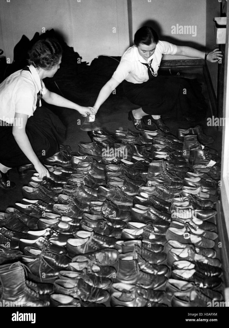 BDM uniforms for Austria, Berlin 1938 Stock Photo - Alamy