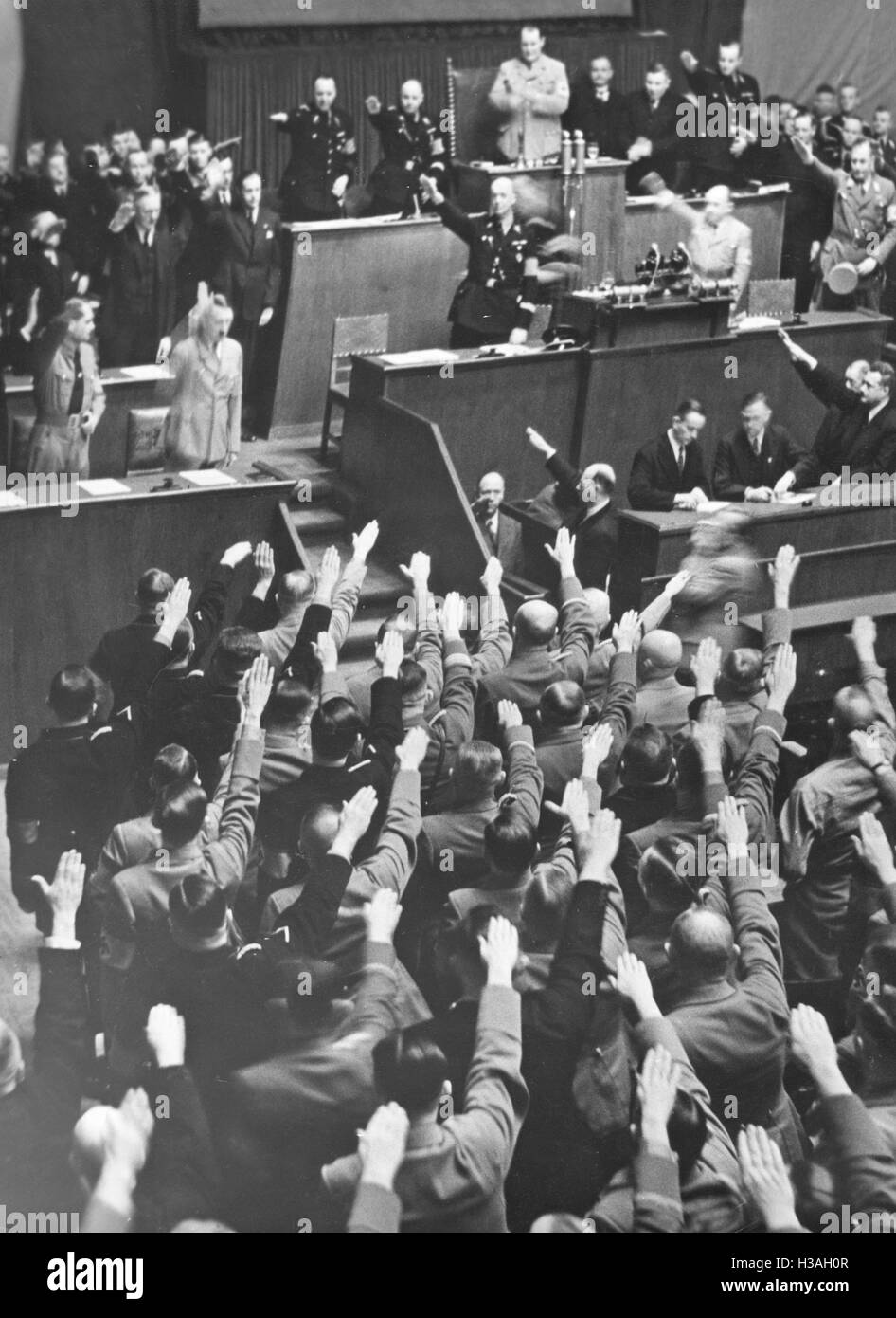 Hitler salute in the Reichstag in the Berlin Kroll Opera House, 1936 Stock Photo