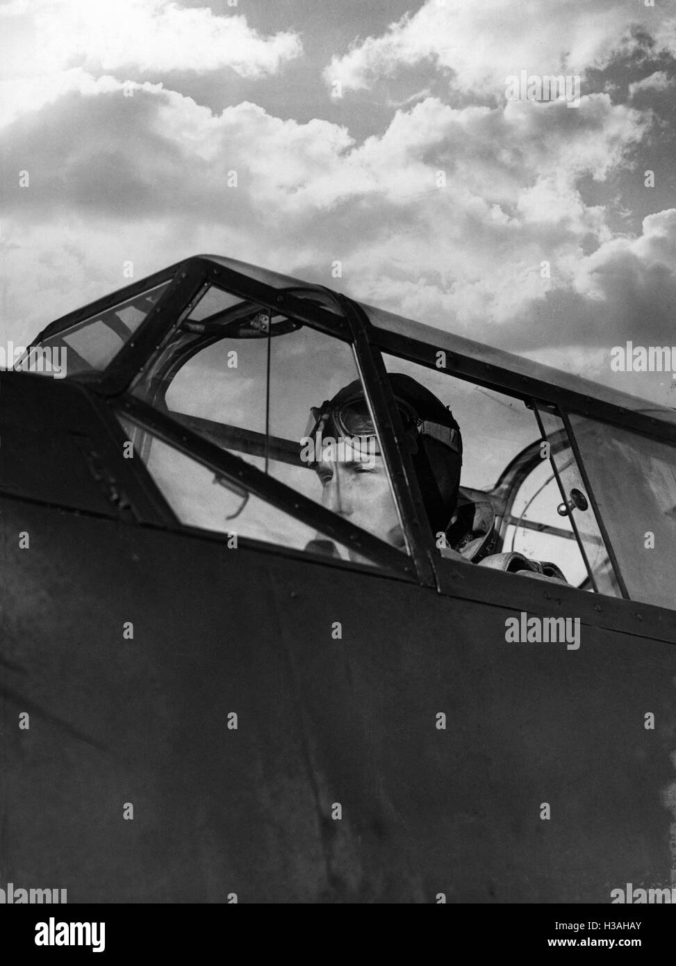 Pilot in the cockpit of a fighter jet, 1938 Stock Photo