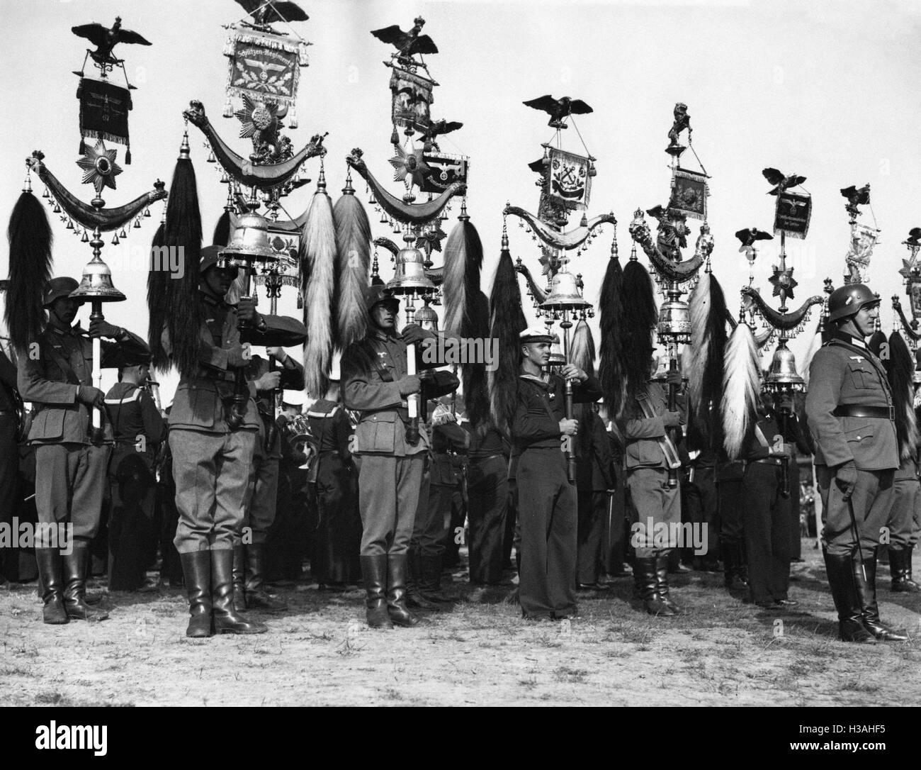 Turkish crescents of various music bands of the Wehrmacht before a concert, 1937 Stock Photo