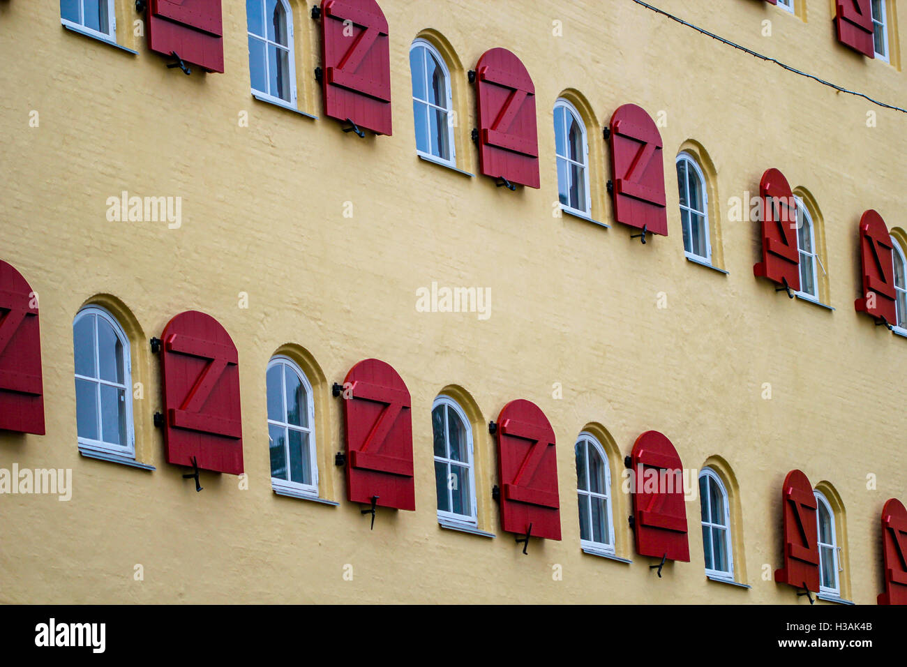 Image showcasing Scandinavian houses with a lot of windows Stock Photo - Alamy