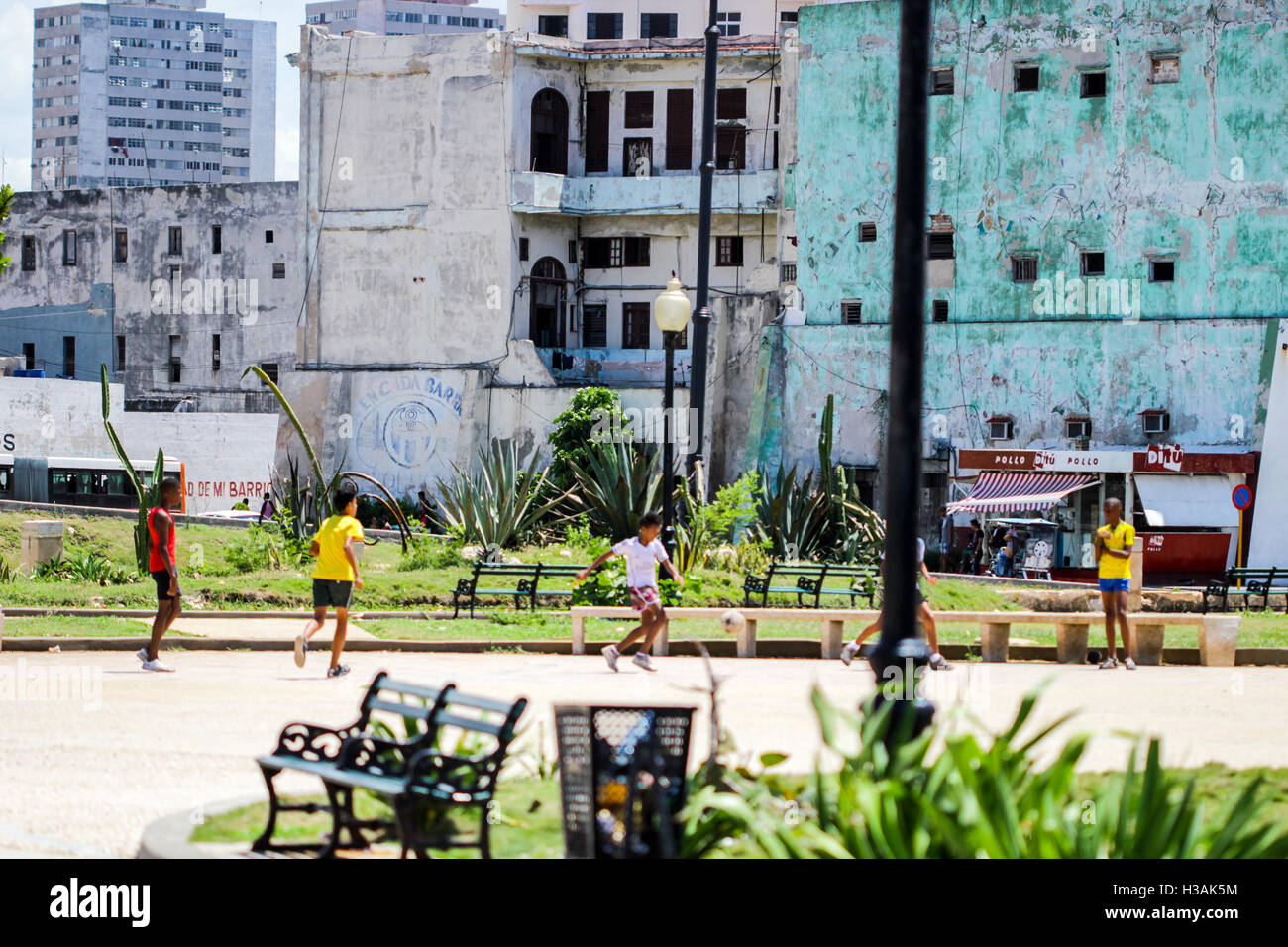 Vibrant life in Cuba Havana, groups of people families friends enjoying ...