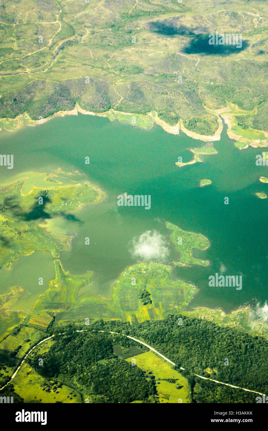 Airplane window view while landing Stock Photo - Alamy