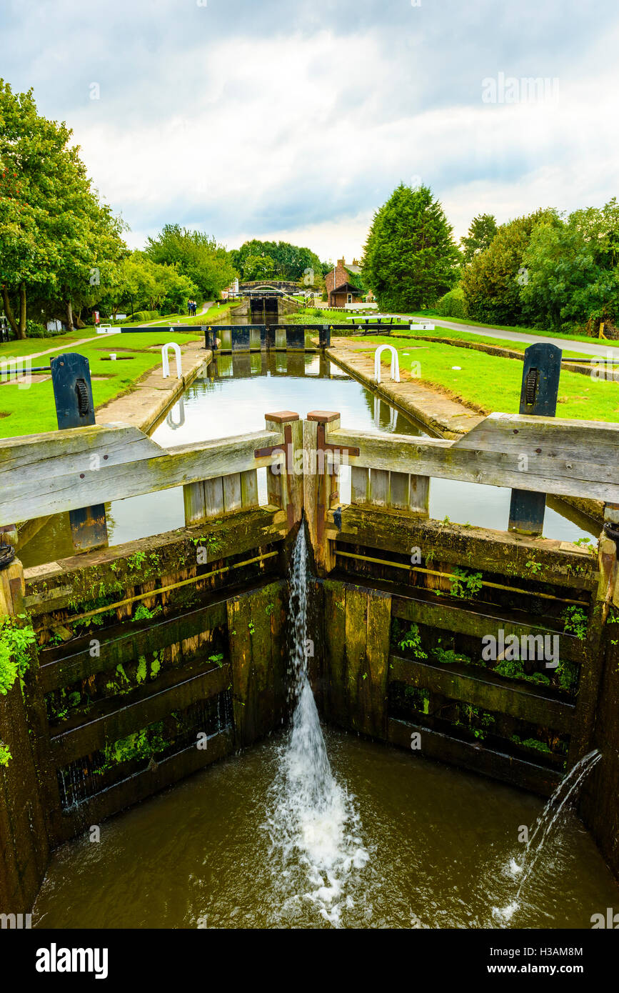 Locks on the Rufford Branch of the Leeds and Liverpool Canal just outside Burscough in West Lancashire England UK Stock Photo