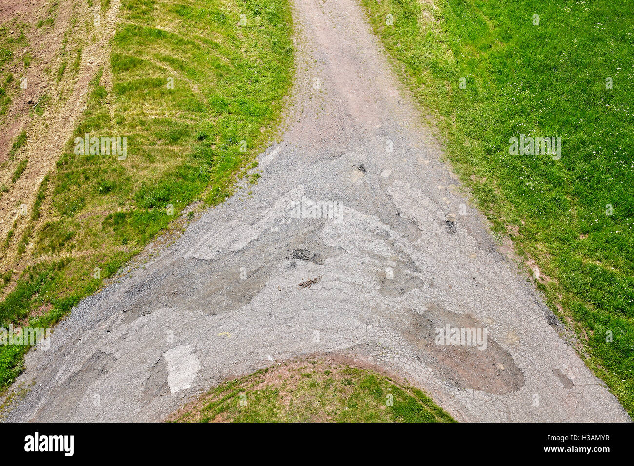 Dirt road crossroads seen from above, conceptual picture. Stock Photo