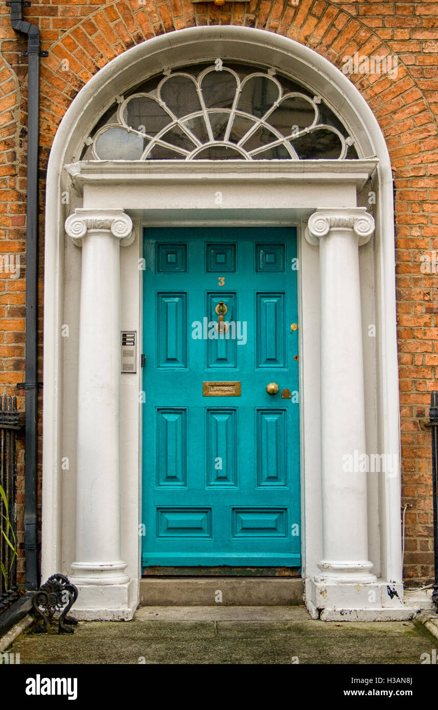 Original turquoise colored door in Georgian Dublin Stock Photo