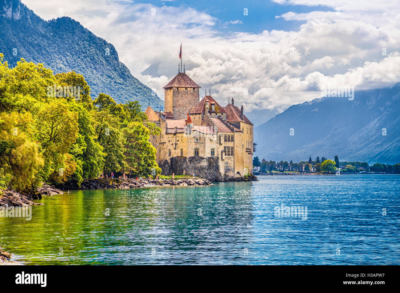Classic view of famous Chateau de Chillon at Lake Geneva, one of Europe's most visited castles, in Veytaux, Switzerland Stock Photo