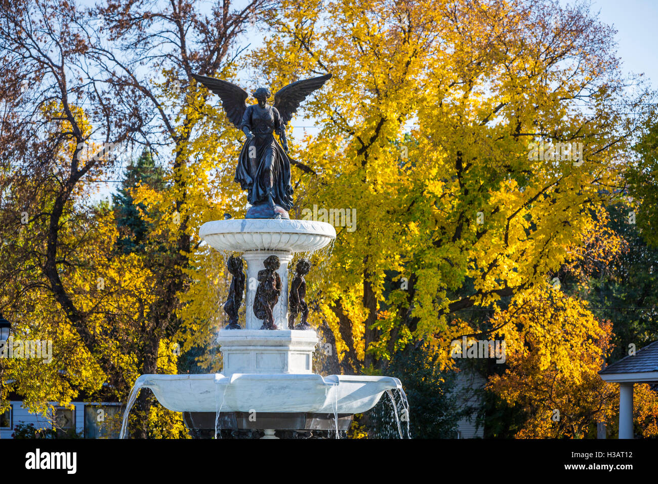The Angel of the Waters decorative fountain with autumn foliage in