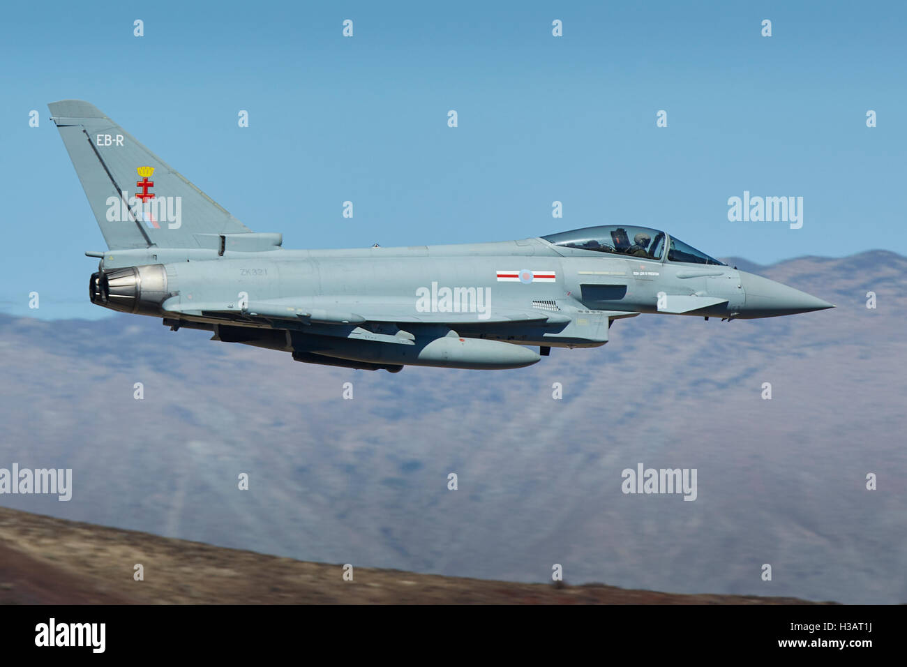 UK Royal Air Force Typhoon FGR4 Jet Fighter, Flies At Low Level Along Rainbow Canyon, California, USA. Stock Photo