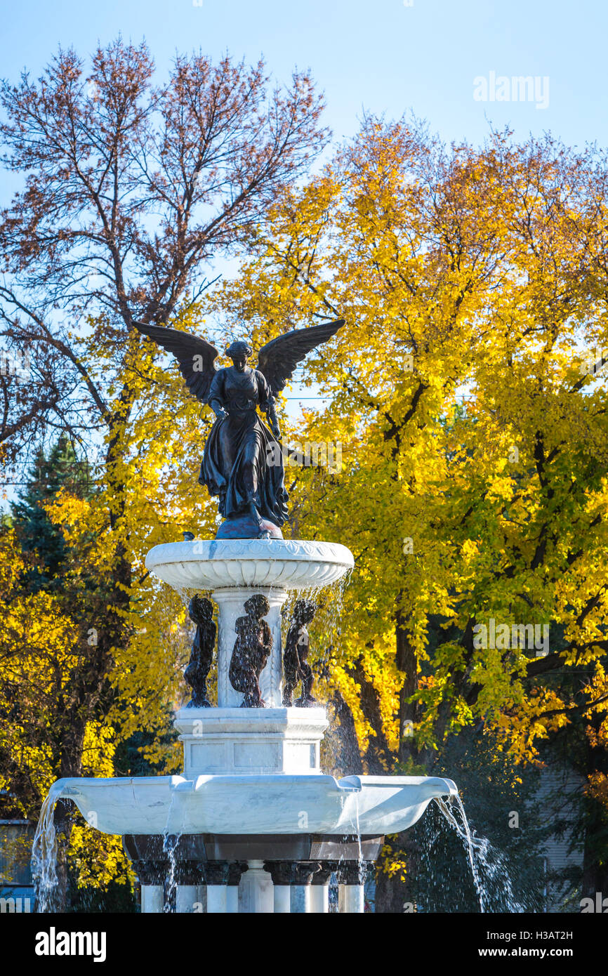 The Angel of the Waters decorative fountain with autumn foliage in