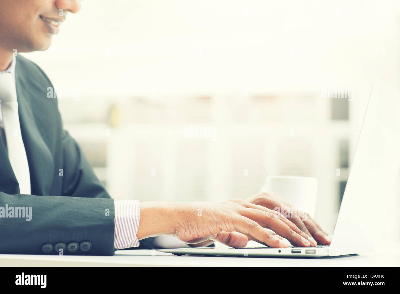 Indian man with laptop hi-res stock photography and images - Alamy