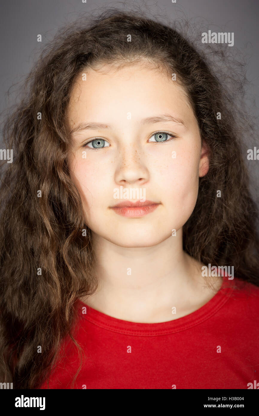 Young pre-teen girl age 10 - 13 years old with long hair. Stock Photo, Teen  Girls 