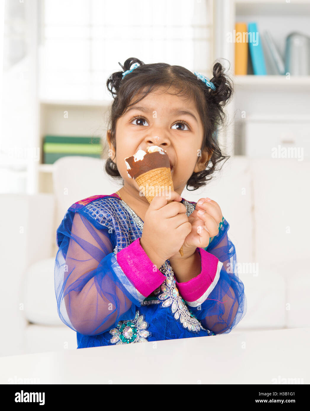 Eating Ice Cream At Home Stock Photo Alamy