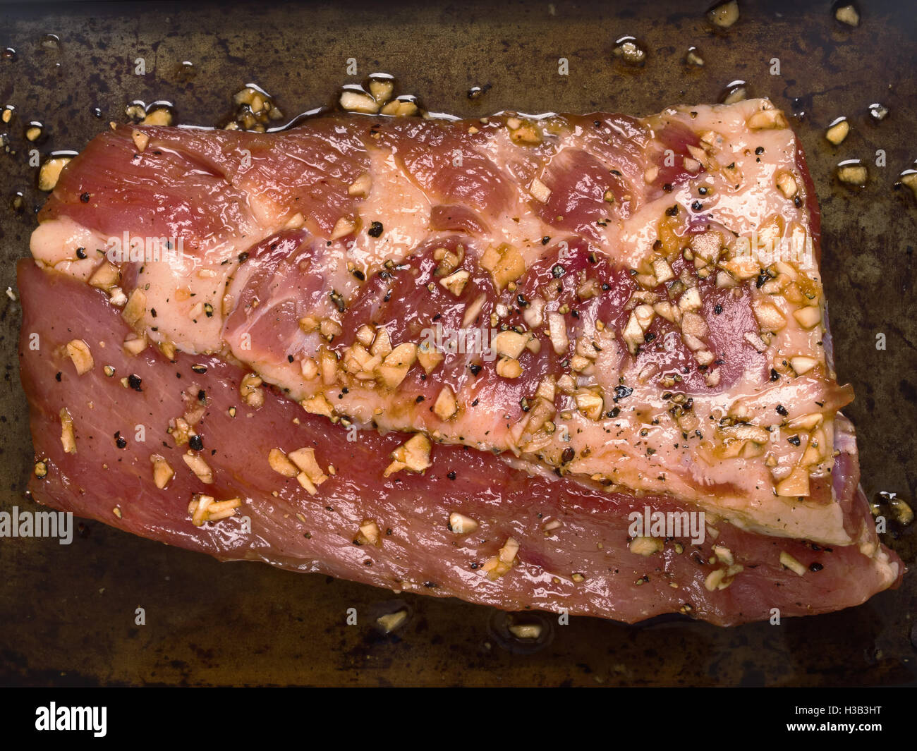 rack of rustic raw marinated pork rib Stock Photo