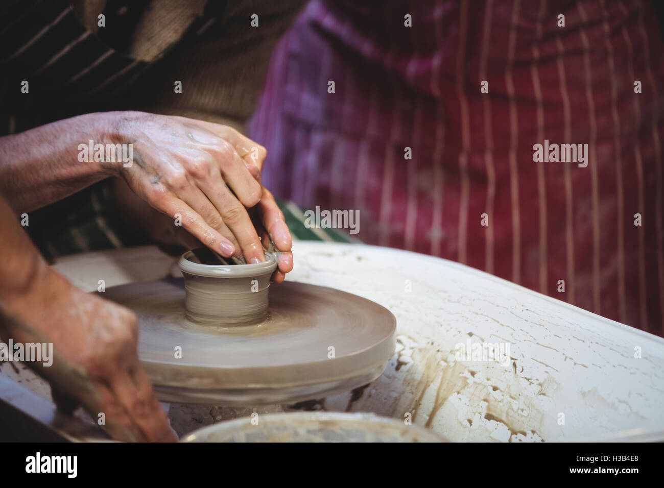 Artists working in pottery Stock Photo Alamy