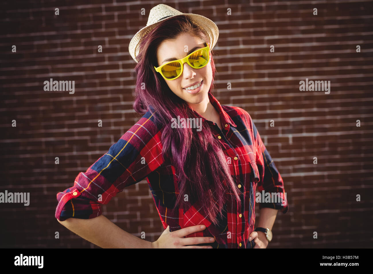 Woman wearing yellow hat hi-res stock photography and images - Alamy