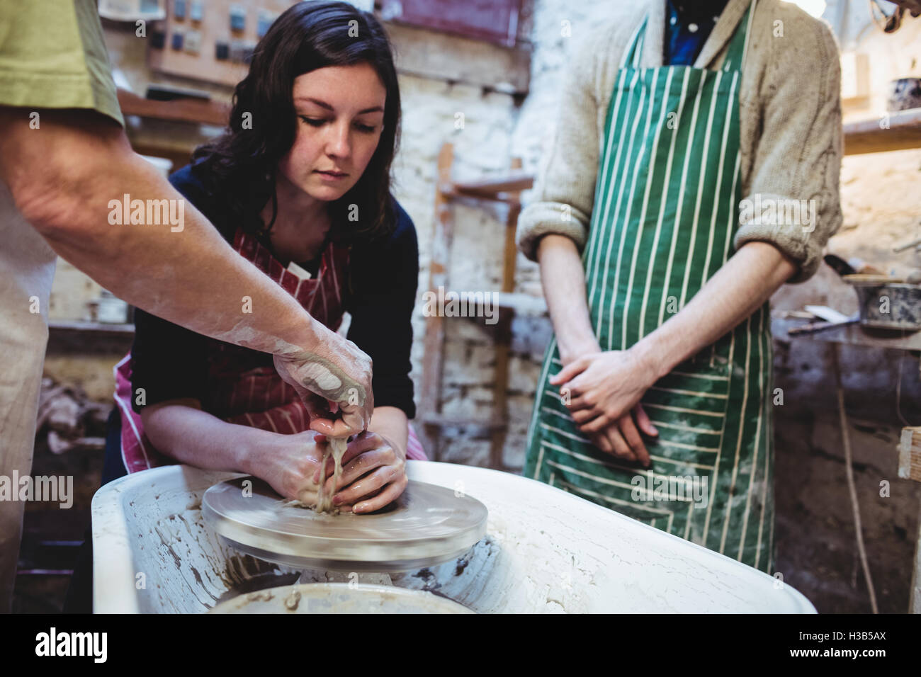 Potters working at workshop Stock Photo - Alamy