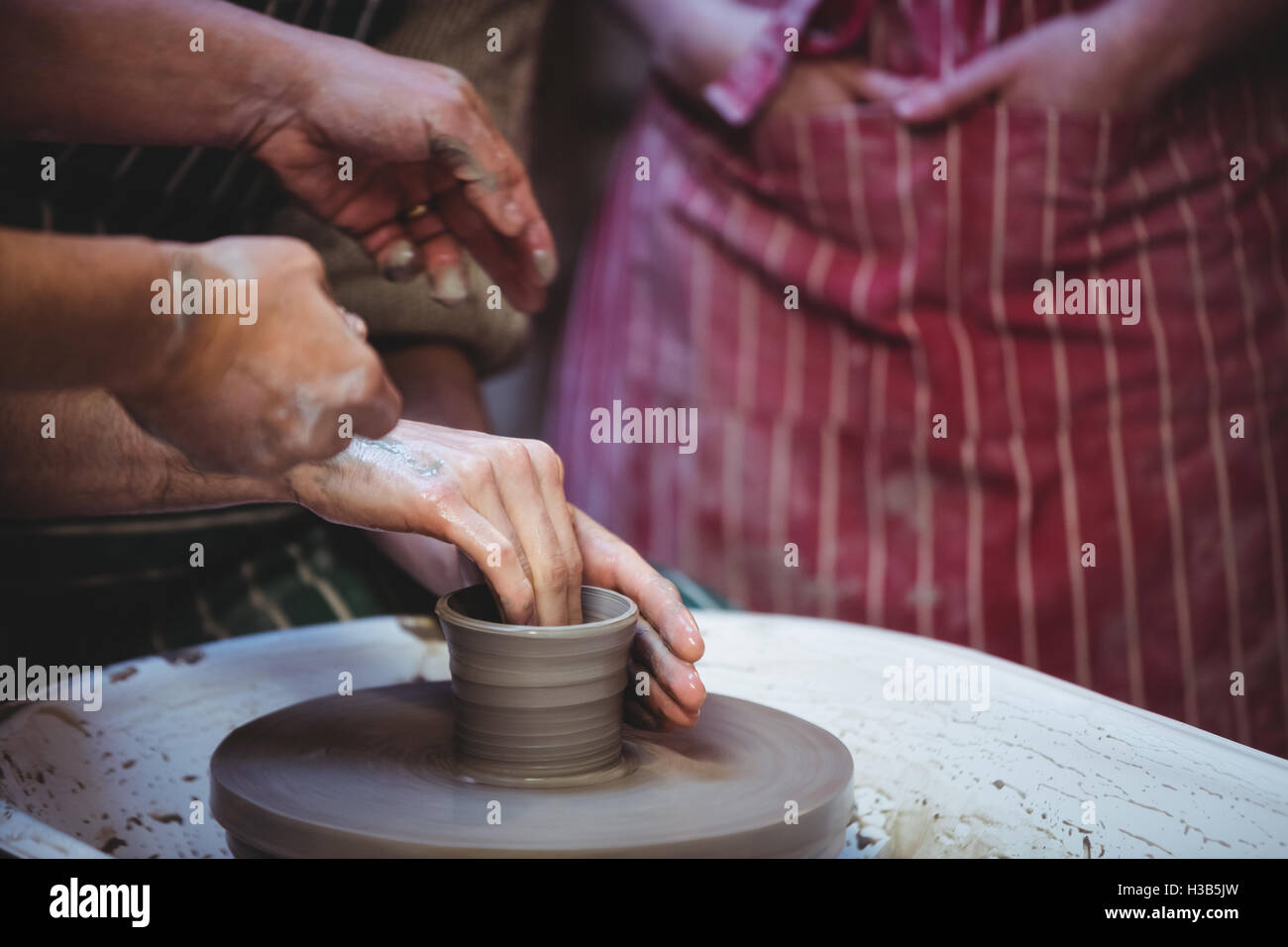 Potters working at workshop Stock Photo - Alamy
