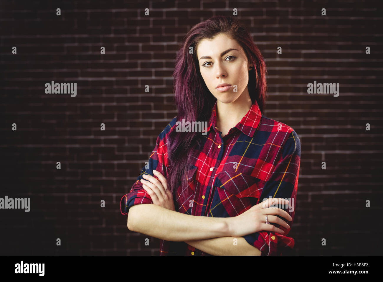 Stern woman arms crossed hi-res stock photography and images - Alamy