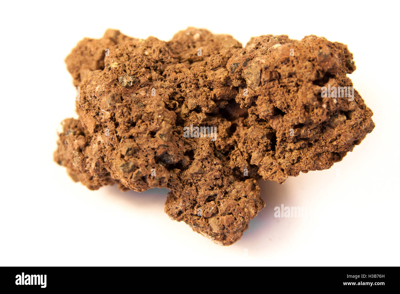 macro shot of a fine grained, extremely vesicular volcanic rock called pumice Stock Photo