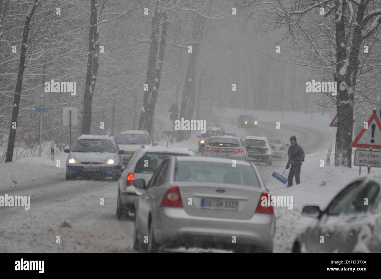 Dresden: Street with cars in snowfall, , Sachsen, Saxony, Germany Stock Photo