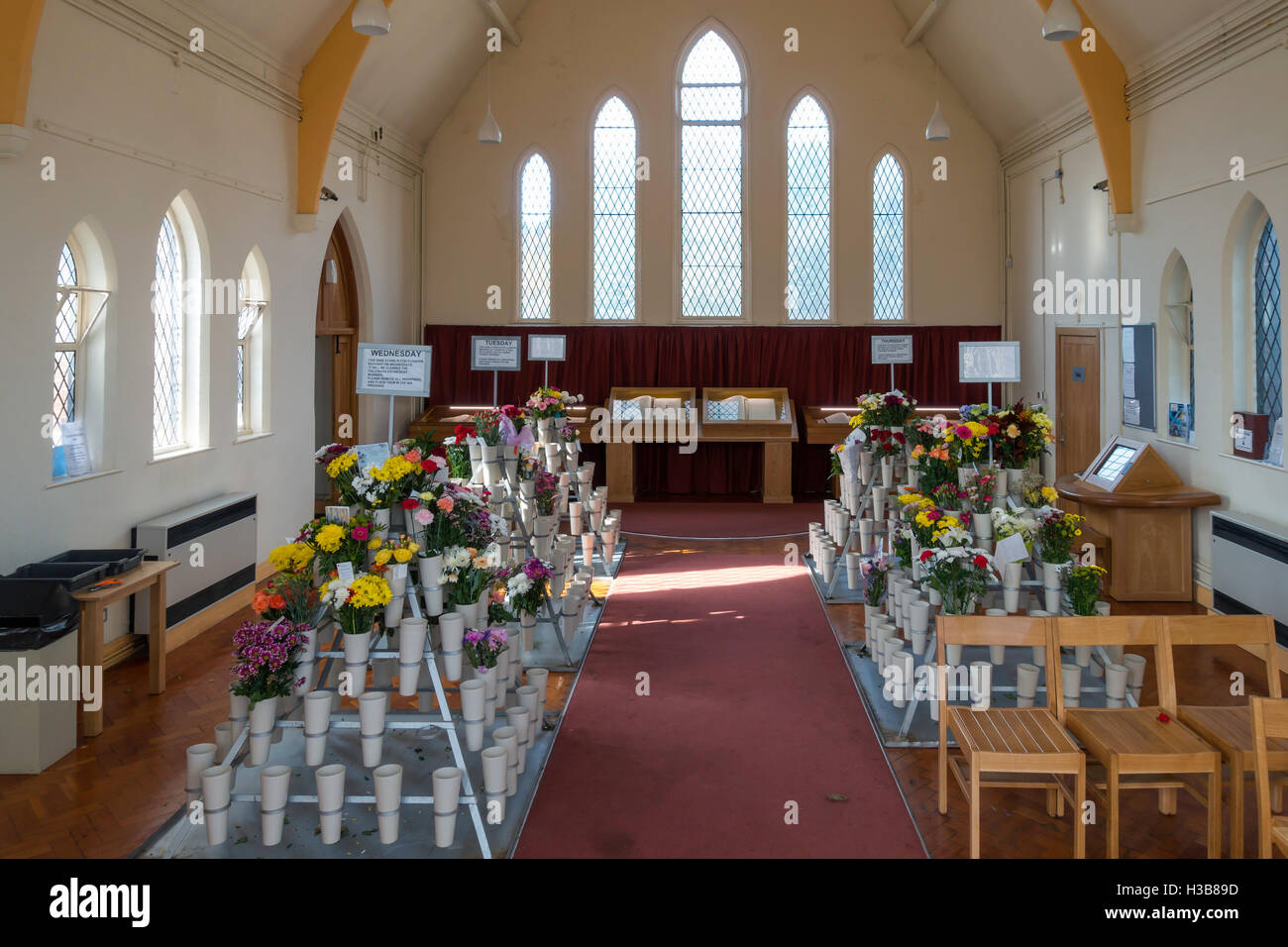 Flowers left in the Chapel of Remembrance in Acklam Cemetery Middlesbrough Stock Photo