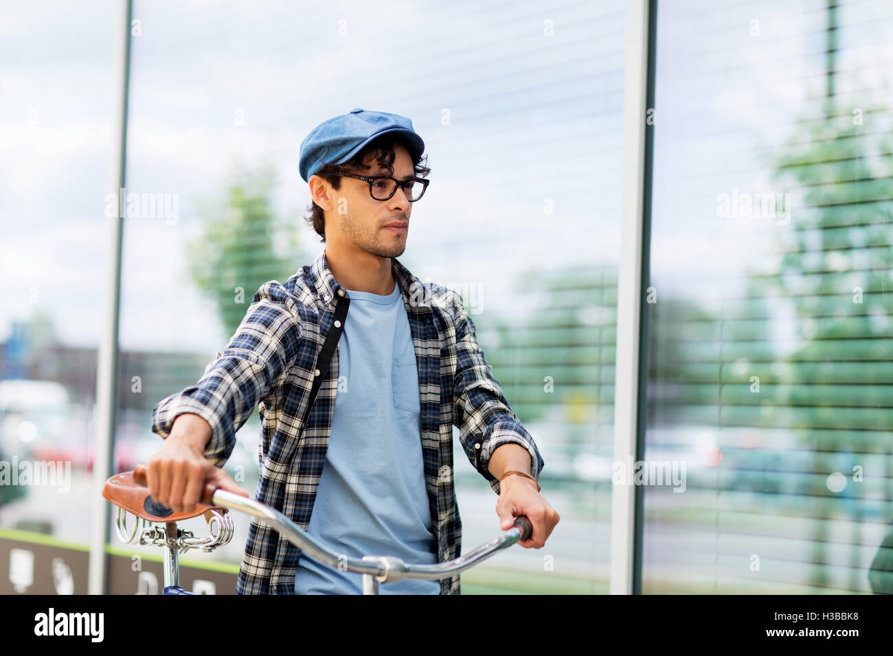 hipster man walking with fixed gear bike Stock Photo Alamy