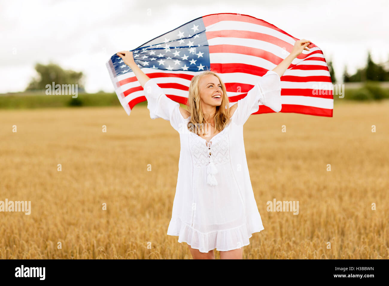 Teen holding american flag hi-res stock photography and images - Alamy