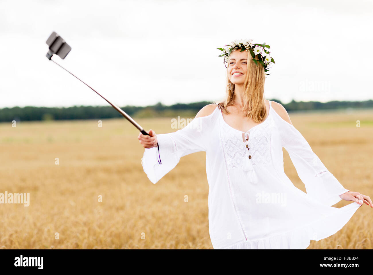 happy young woman taking selfie by smartphone Stock Photo - Alamy