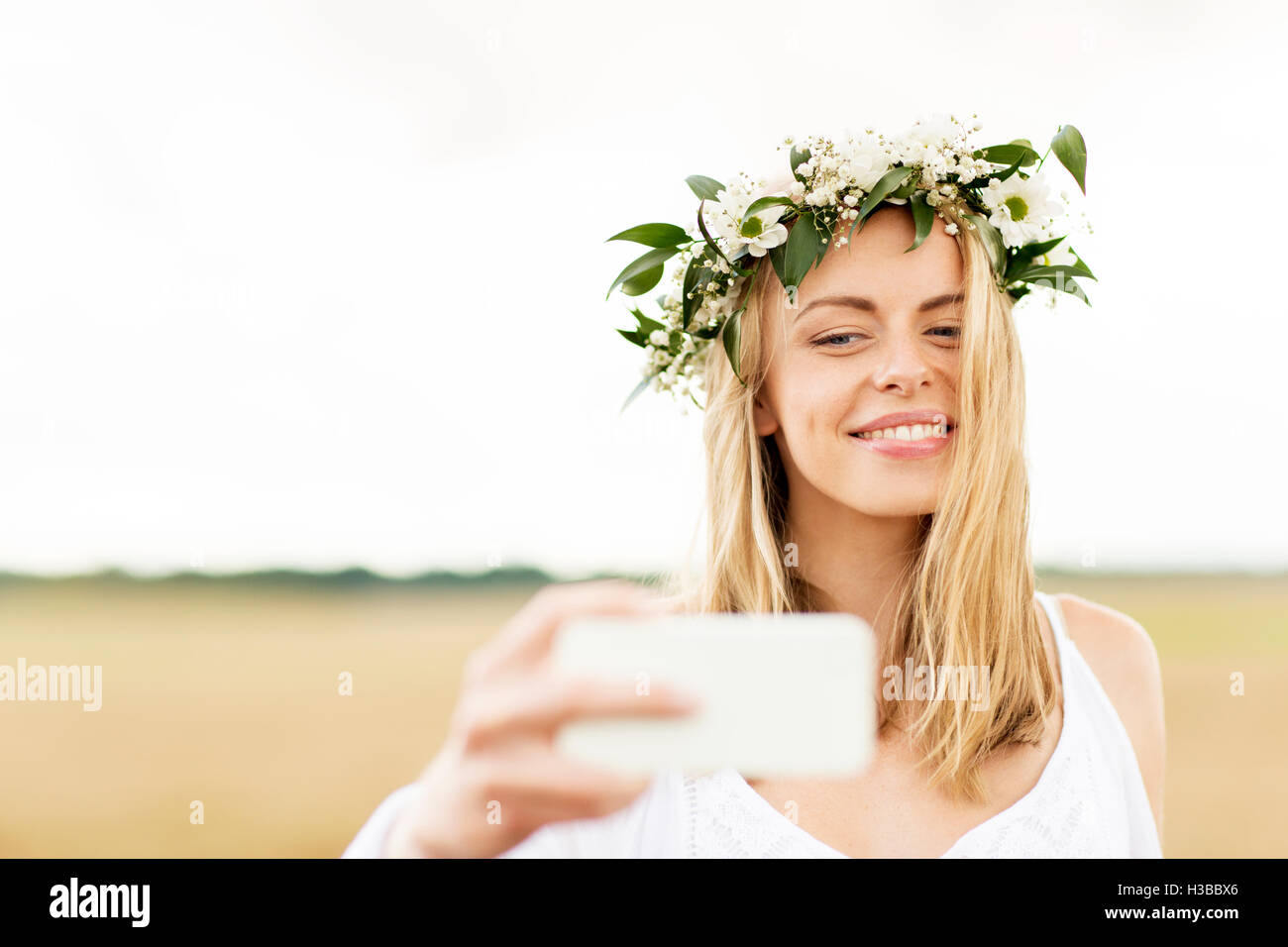 happy young woman taking selfie by smartphone Stock Photo - Alamy