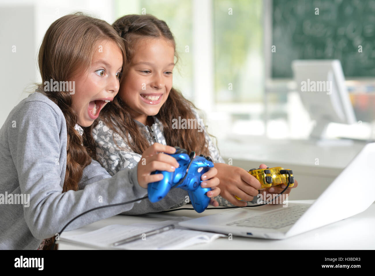 Children with laptop at home Stock Photo - Alamy