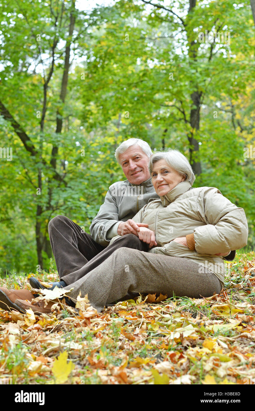 Couple in autumn park s Stock Photo - Alamy