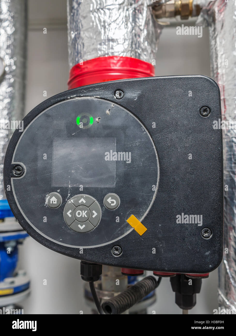 Hot water circulating pump installed in boiler room Stock Photo