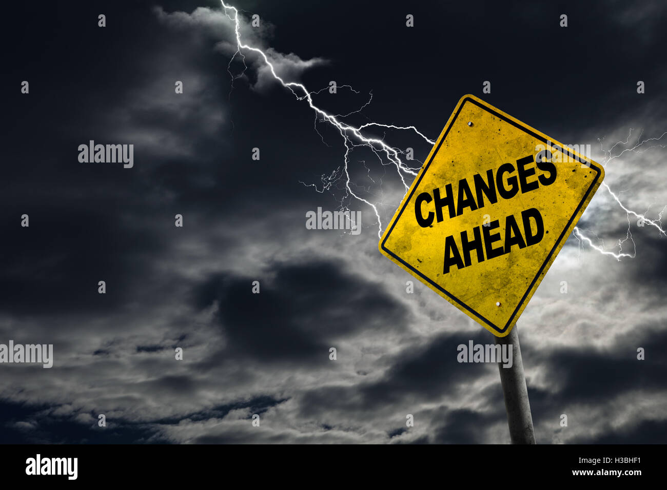 Changes Ahead sign against a stormy background with lightning and copy space. Concept of bad things to come. Stock Photo