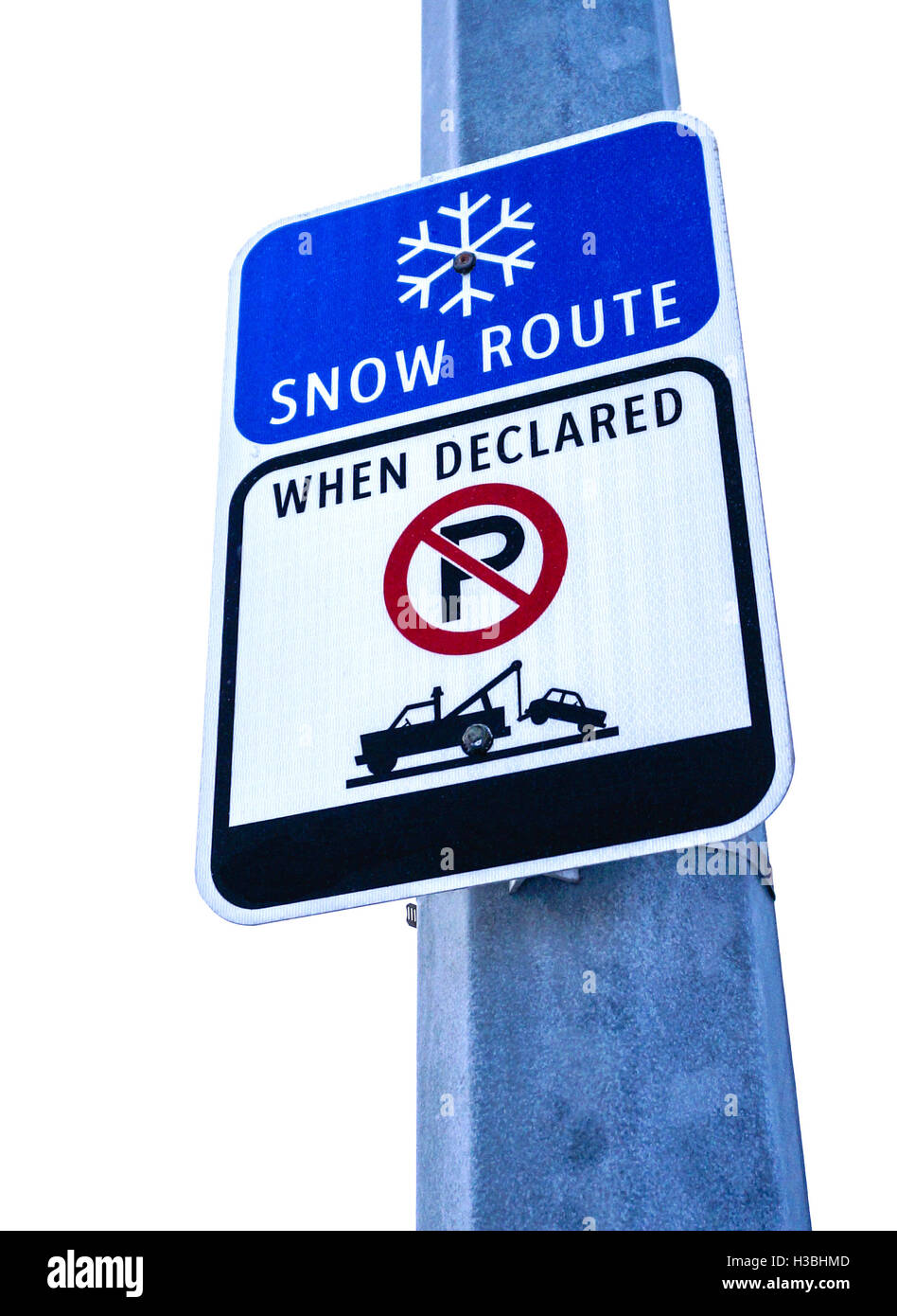 An isolated snow route sign with no parking symbol. Stock Photo