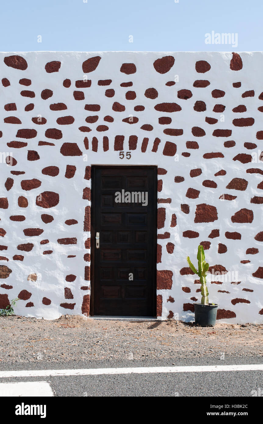 Fuerteventura, Canary Islands, North Africa, Spain: a cactus and details of a house built in the colonial Spanish architecture in the village of Tefia Stock Photo
